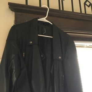 Black leather jacket. Missing size tag.